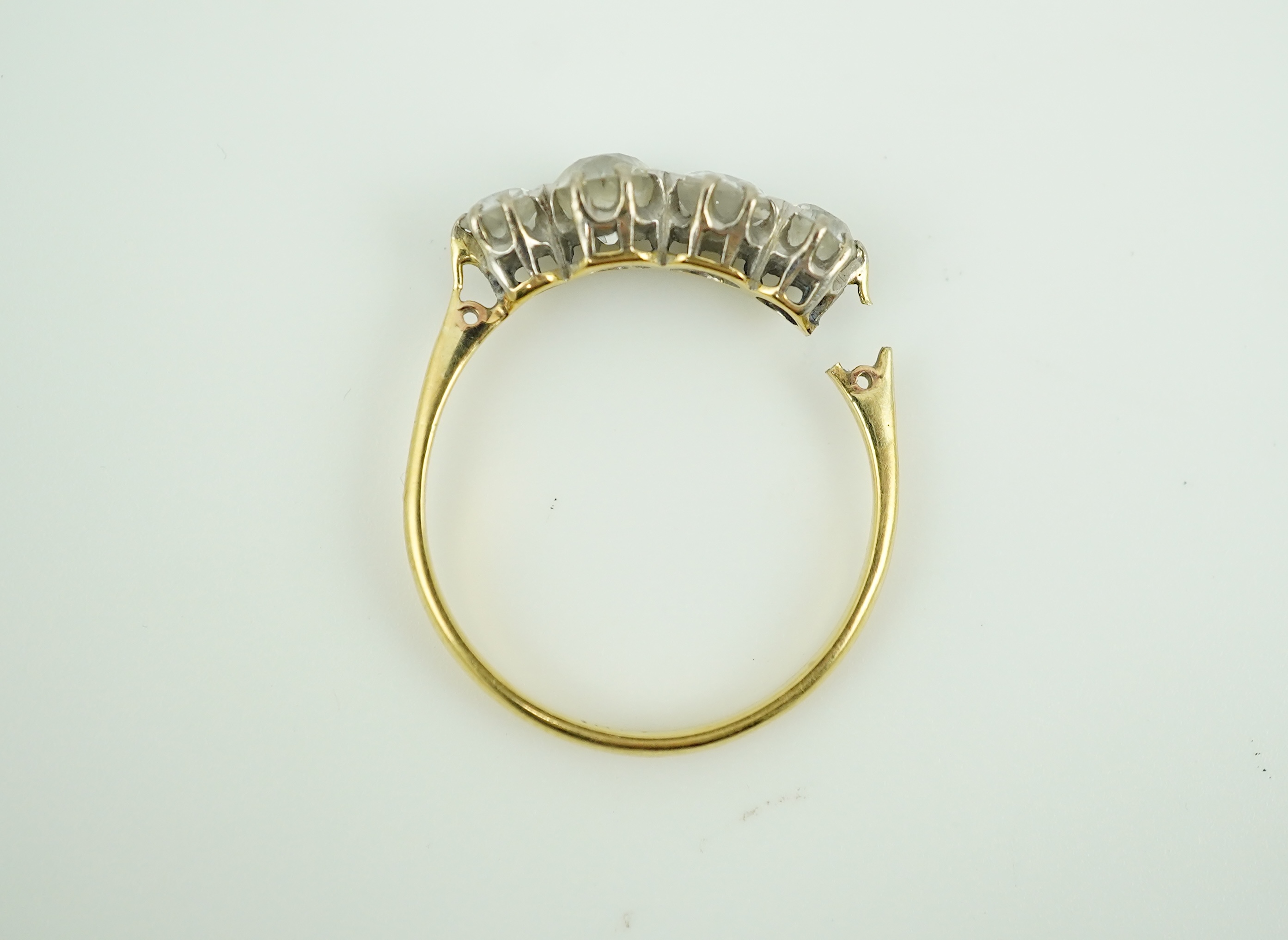 A four-stone diamond ring, early 20th century